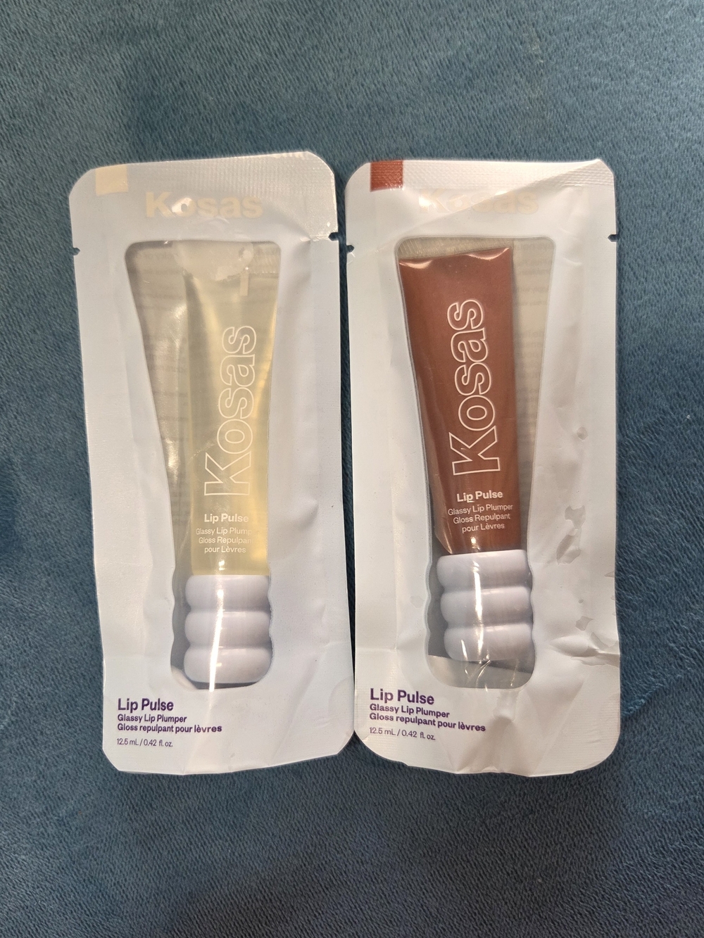 Kosas Lip Pulse Plumpinh Gloss Duo in Clear and Nude